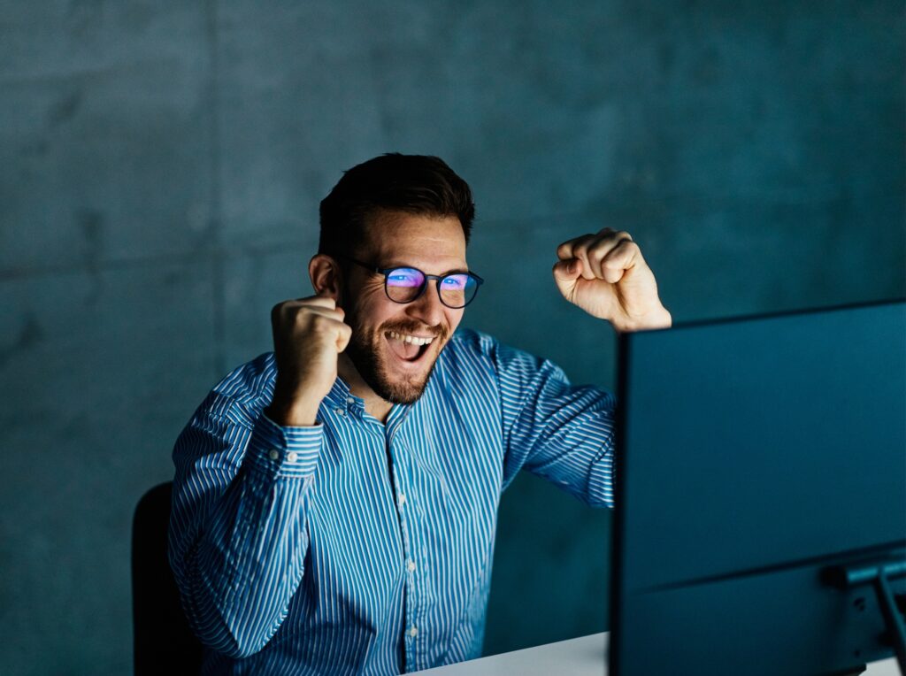 businessman working late night business computer man office winner win light